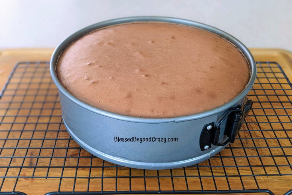 Coffee Toffee Cheesecake fresh out of the oven, cooling on a cooling rack