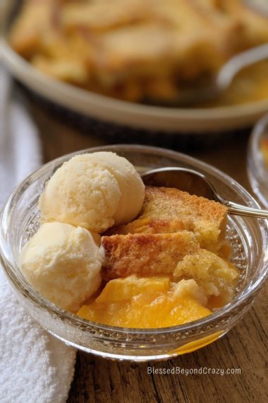 Ice cream served alongside serving of peach cobbler